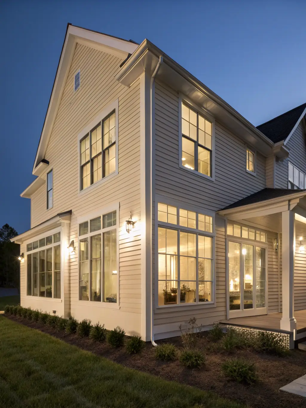 A modern home featuring fiber cement siding, showcasing its sleek appearance and fire-resistant properties, emphasizing the safety and style offered by Wilson and Sons.
